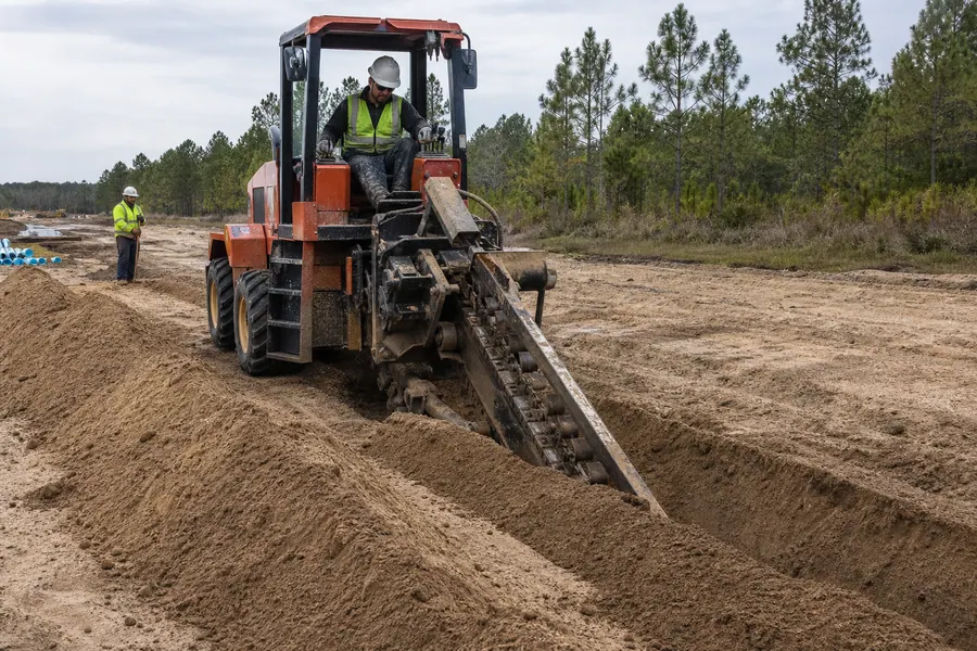 Ditch Witch Trencher (Ride-On) in action