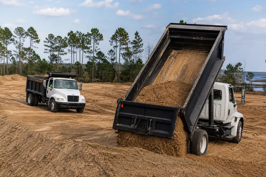 Chevy CAT 3116 Single Axle Dump Truck (×2) in action