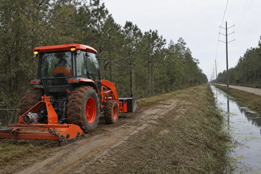 Kubota MX-5400 Tractor w/ 7 Implements in action