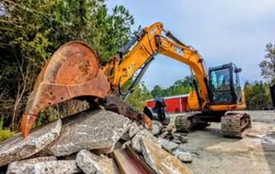Excavator and rock placeholder